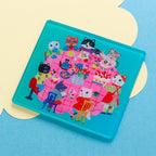 Yumi Kitagishi cat supper stamp mat on blue surface with cream cloud cutout