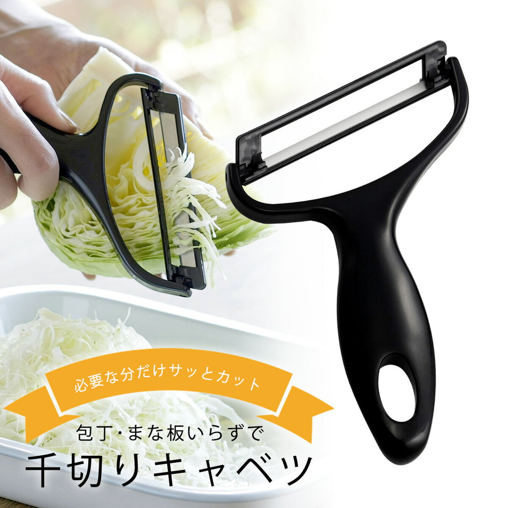 Shimomura Kihan wide-bladed cabbage peeler shredding green cabbage into ribbons without a cutting board