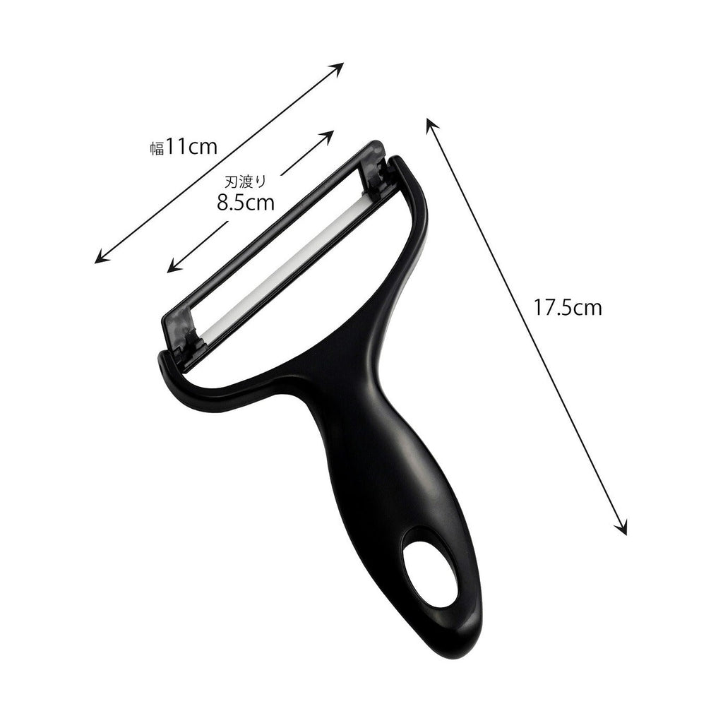 Black-handled Shimomura Kihan vegetable peeler with stainless steel blade and safety holder