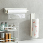 Shimoyama white wall-mounted rack storing plastic wrap and patterned towels in kitchen
