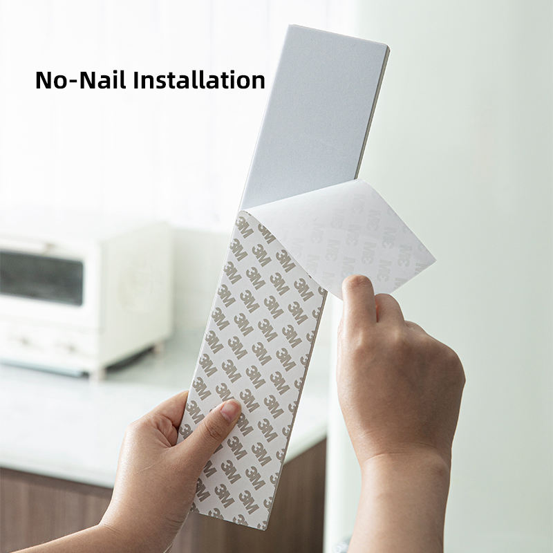 Close-up of Shimoyama holder 3M adhesive backing with no-nail installation label