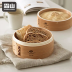 Shimoyama 18cm bamboo steamer holding sliced bread on checkered cloth
