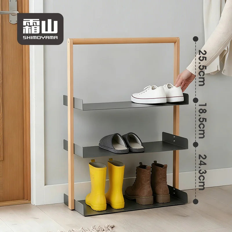 Studio shot of empty Shimoyama shoe rack with raised metal lips to prevent shoes from sliding off