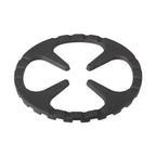 Top-down view of circular Shimoyama cast iron trivet with curved openings
