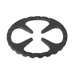 Top-down view of circular Shimoyama cast iron trivet with curved openings