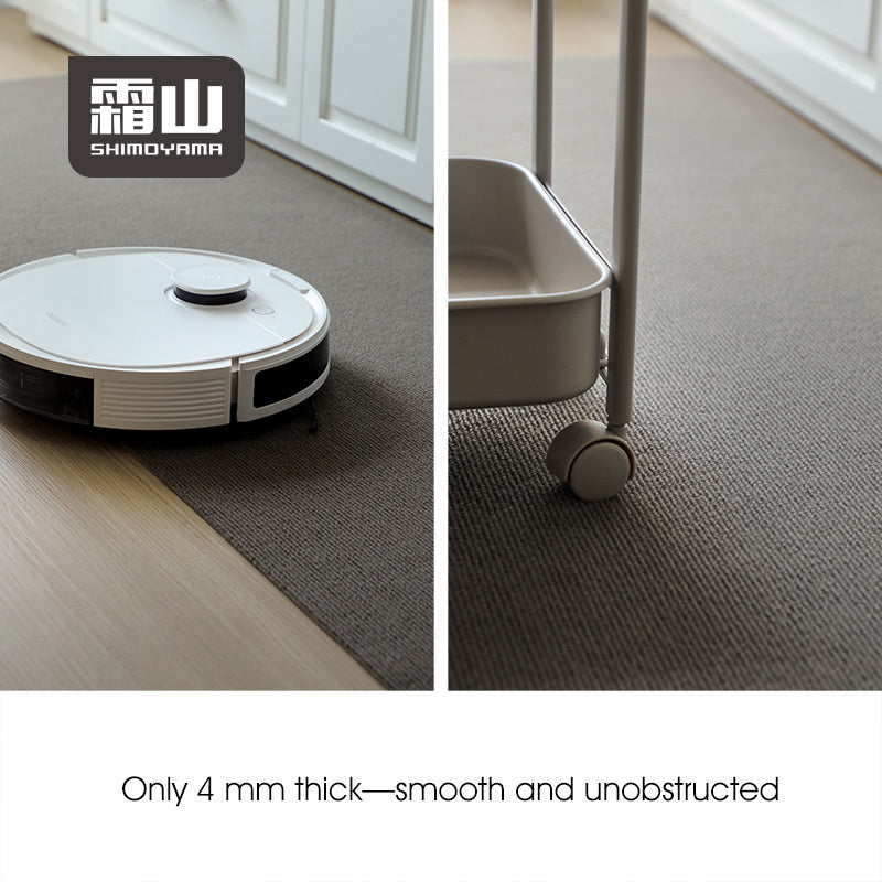 Thin 4mm khaki kitchen mat allowing smooth passage for robot vacuum and cart wheels