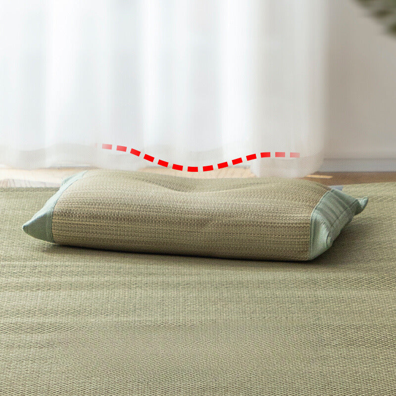 Side profile of Shimoyama Rush Straw Pillow showing ergonomic contour support