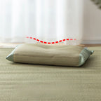 Side profile of Shimoyama Rush Straw Pillow showing ergonomic contour support