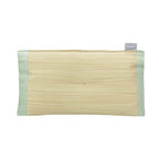 Front view of beige woven rush straw pillow with light green fabric edges