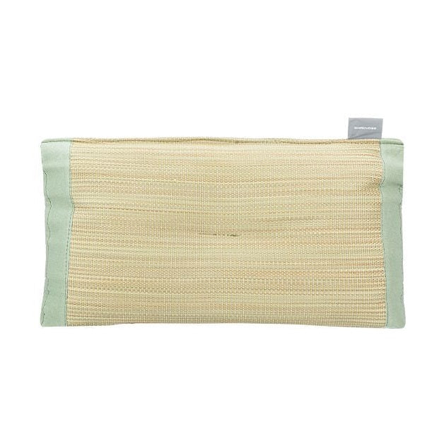 Shimoyama Rush Straw Pillow with light green cotton trim on white background