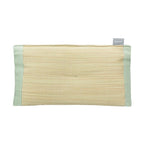 Shimoyama Rush Straw Pillow with light green cotton trim on white background