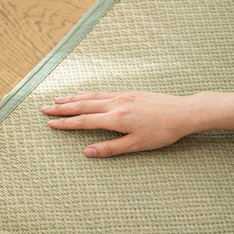 Close-up of textured natural rush weave and fine fiber detail on Shimoyama pillow