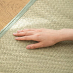 Close-up of textured natural rush weave and fine fiber detail on Shimoyama pillow