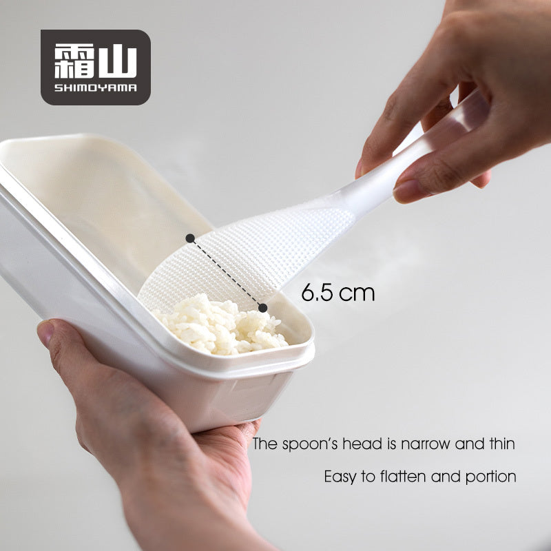 Using narrow thin-head Shimoyama rice scoop to portion steaming rice