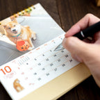 Hand writing on the Walk with Shiba Inu Maru Desk Calendar 2027