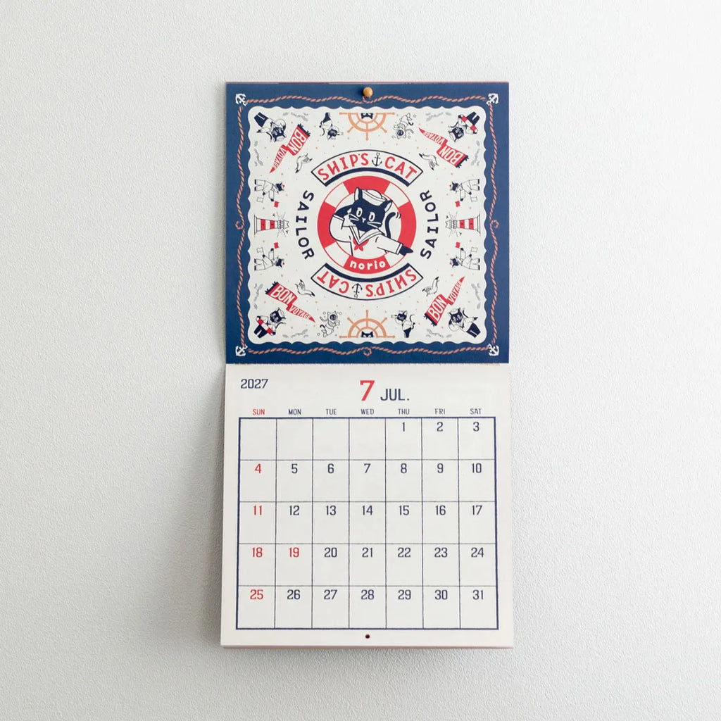 ob1toy LP Wall Calendar 2027 hanging open, artwork above and month below