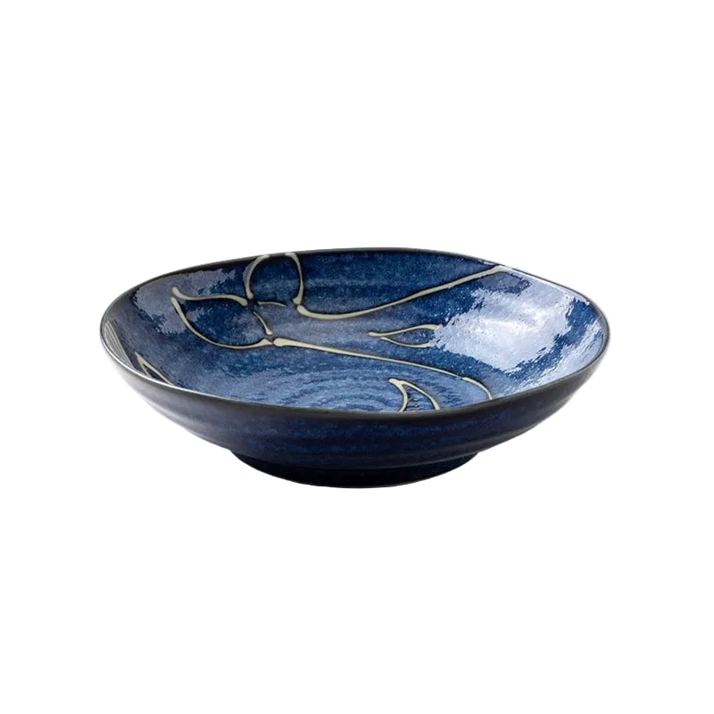 Side profile of 21cm deep ceramic dinner plate showing raised rim and interior whale glaze detail