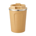 Front view of tan Skater vacuum insulated travel tumbler with flip-flap lid