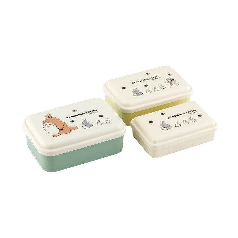 Three-piece Totoro themed lunch box set featuring brown and gray characters on mint green and yellow bases