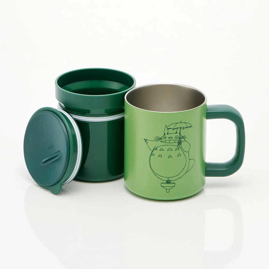 Totoro travel mug components laid out including lid, outer mug, and inner cup