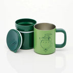 Totoro travel mug components laid out including lid, outer mug, and inner cup