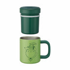 Disassembled view of Totoro travel mug showing removable microwave-safe inner cup