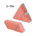 Coral pink silicone pen stand displaying open compartments and exterior
