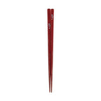 Shimmering red glitter chopsticks featuring silver cherry blossom patterns