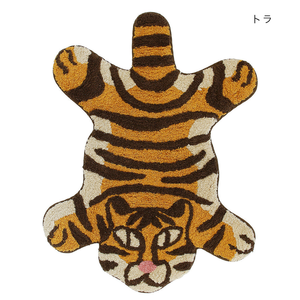 Tiger shaped tufted cotton rug with comic face and orange stripes