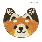 Red panda head shaped tufted cotton mat in rust and cream with dark brown ears