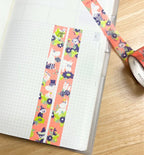 Moomin orange washi tape with flowers on notebook