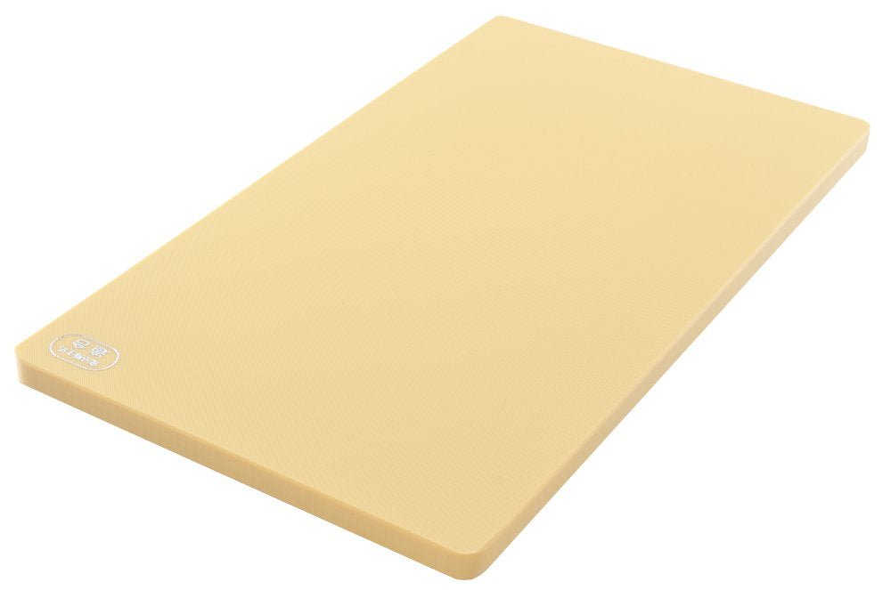 Yoshikawa beige elastomer cutting board showing bottom-left logo detail