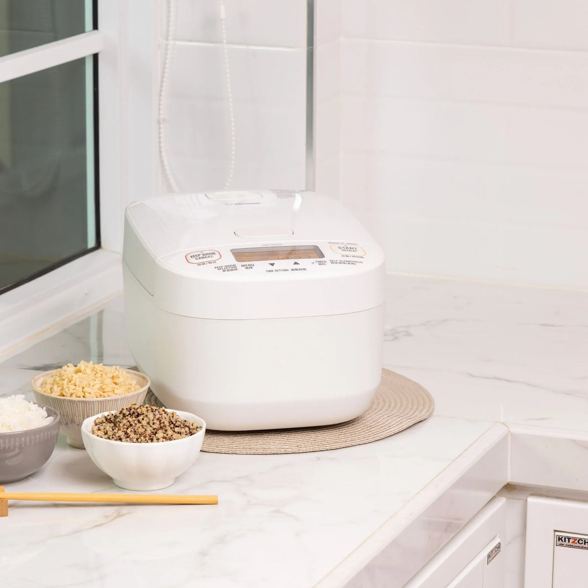 Zojirushi NW-YAQ rice cooker in a kitchen setting