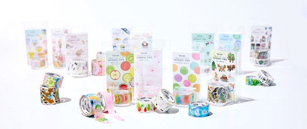 Assorted bande decorative masking tape rolls in clear packaging showing fruit and dot patterns