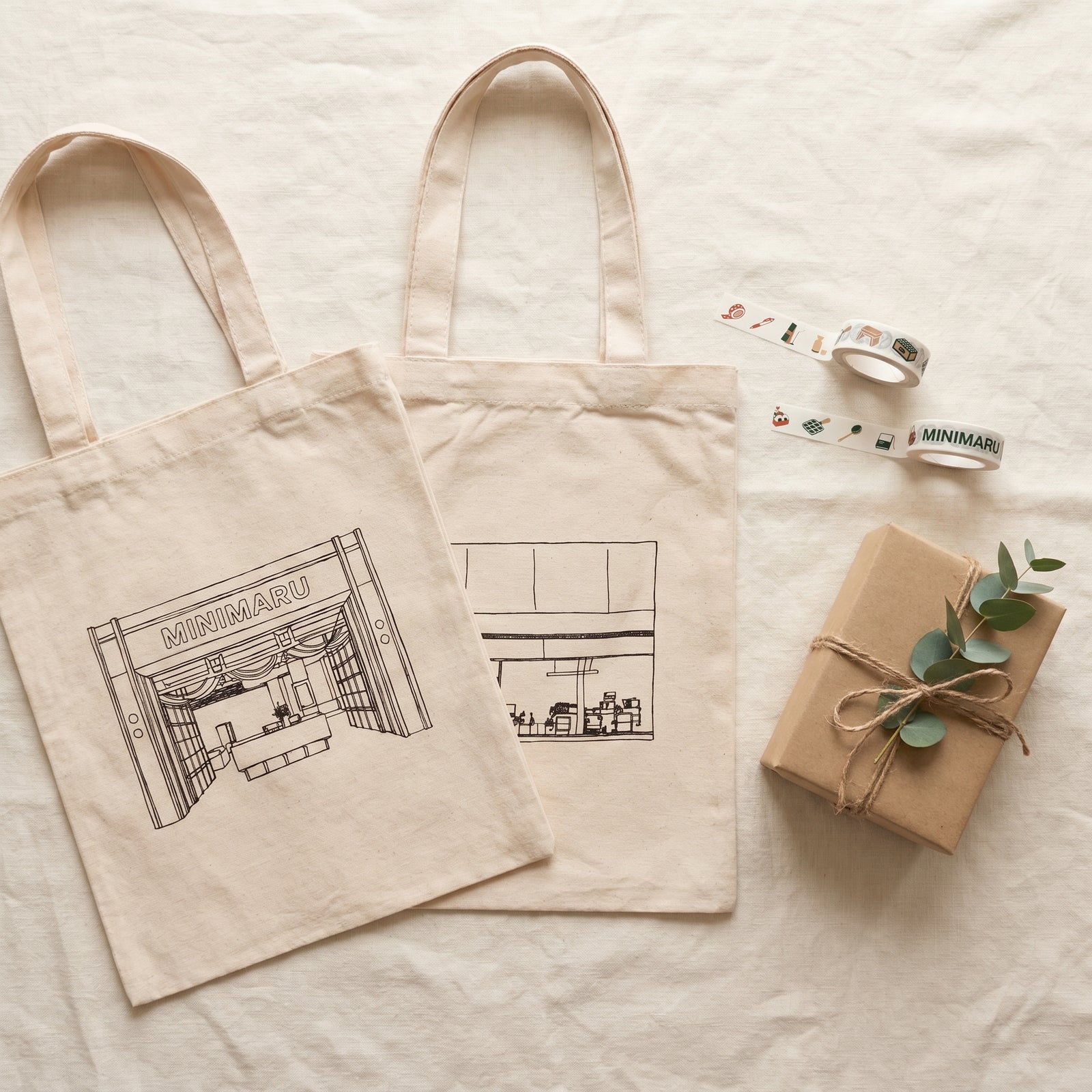 Free anniversary gift — Minimaru A4 canvas tote bag with washi tape and a wrapped gift box