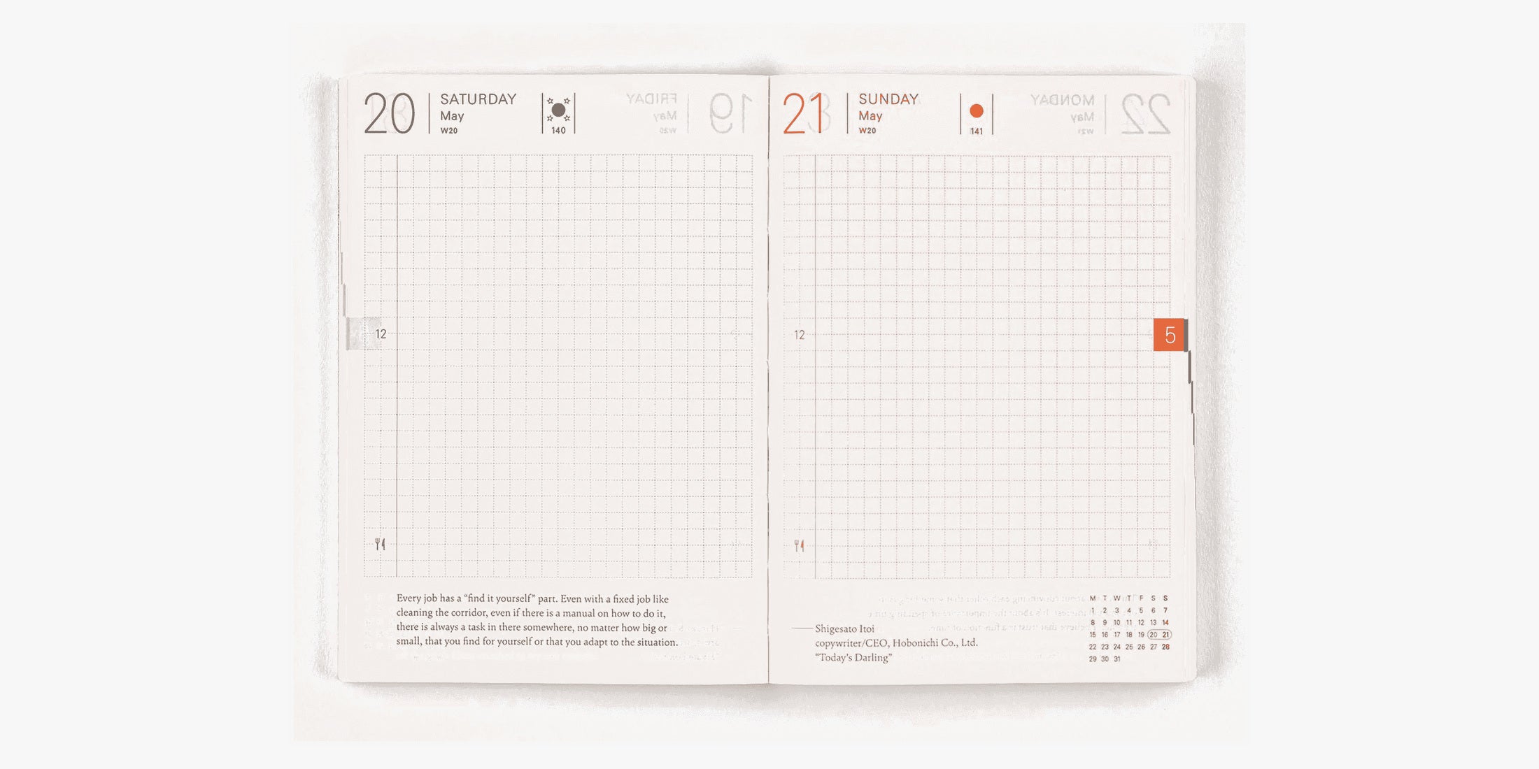Hobonichi Techo open to a two page daily spread showing the grid layout, date headers and daily quote