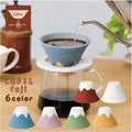 Blue COFIL Fuji ceramic coffee filter brewing pour-over into glass carafe