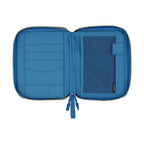 Interior view of blue Hobonichi cover featuring fabric pockets and mesh storage compartments