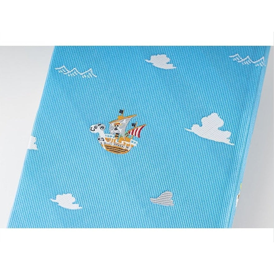 Blue ribbed fabric diary cover with embroidered pirate ship and cat character