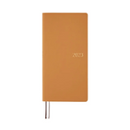 Warm orange Hobonichi Techo 2023 compact diary with gold embossed year