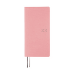 Pink Hobonichi Techo 2023 weekly planner with silver embossed year and ribbons