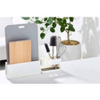 Diatomaceous earth board stand with utensil holder containing spatula and whisk