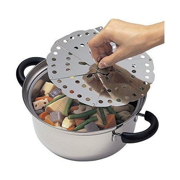 Stainless steel adjustable drop lid steamer in use on pot with vegetables