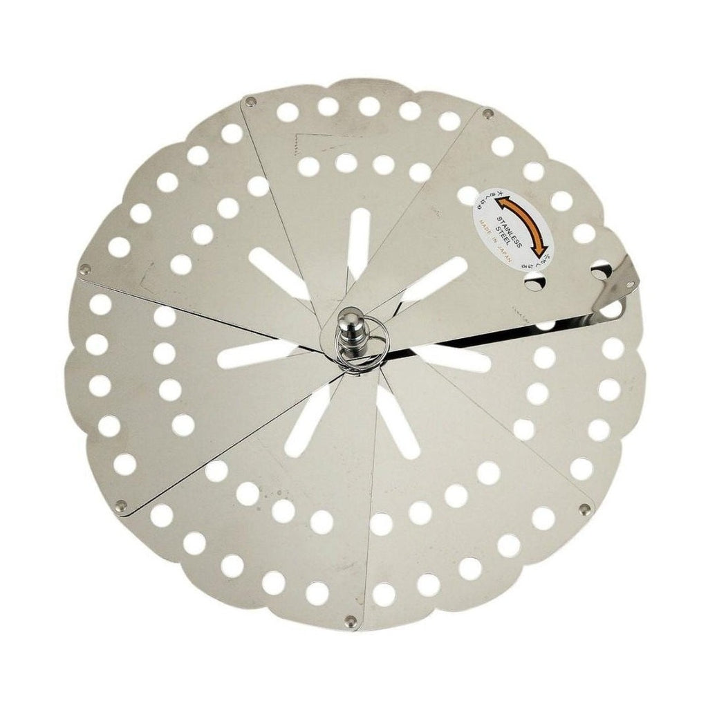 Top view Kai adjustable stainless steel drop lid with scalloped edge