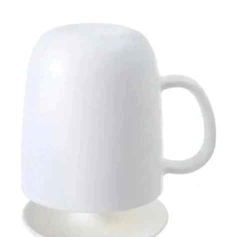 Side view of white Marna bath cup with C-shaped handle on stand