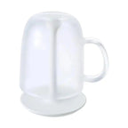 White Marna bath cup inverted on matching stand with handle