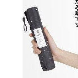 Nifty Colors dark gray mini umbrella with white speckles and UV label