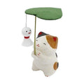 Ryukodo Rain Day Cat figurine with umbrella and wind chime