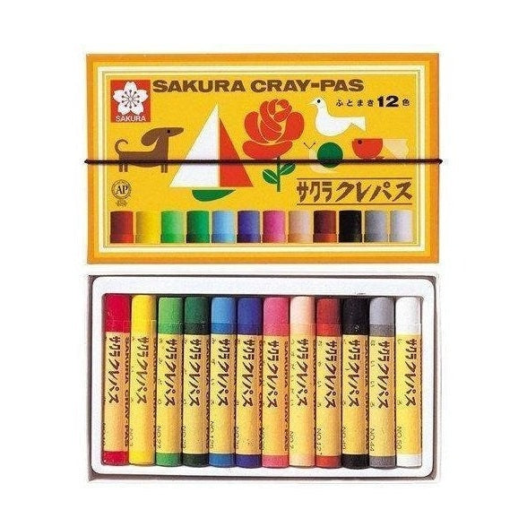 Sakura Cray-Pas 12-color pastel crayons in open box with cherry blossom logo