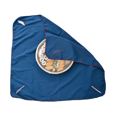 Navy blue 68cm furoshiki used as eco-friendly sushi wrap with red trim and logo